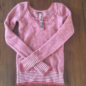 Orange and white striped sweater